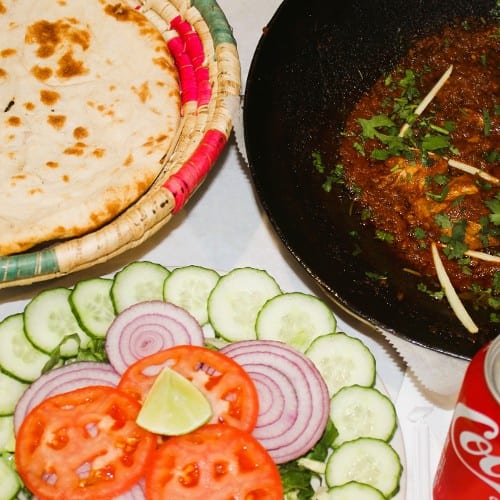 Chicken Kadai (Half Pound) +2 Plain Naan + Can of Soda +Salad +Green Sauce.